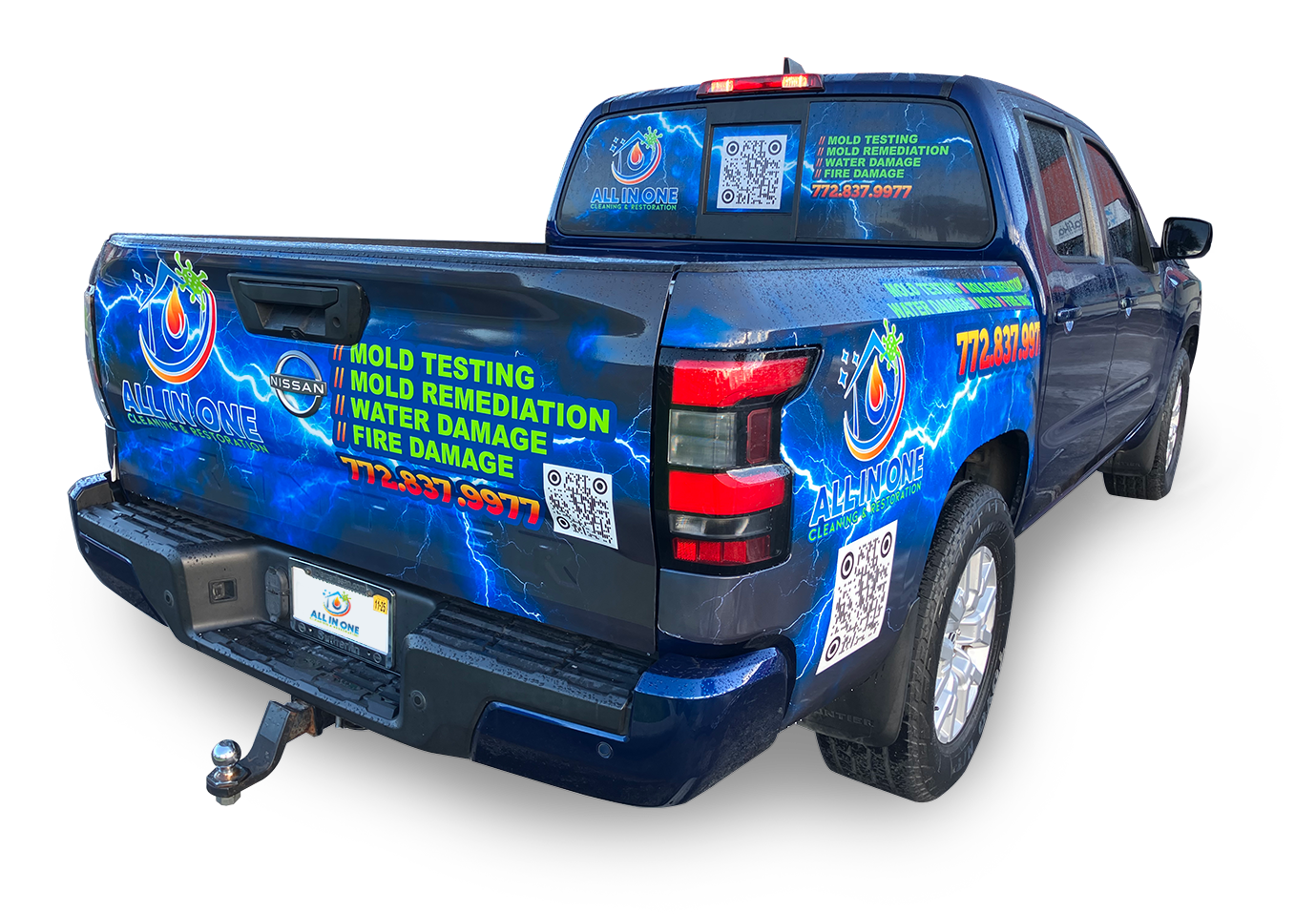 Branded Nissan Frontier company truck for All In One Cleaning & Restoration parked on-site