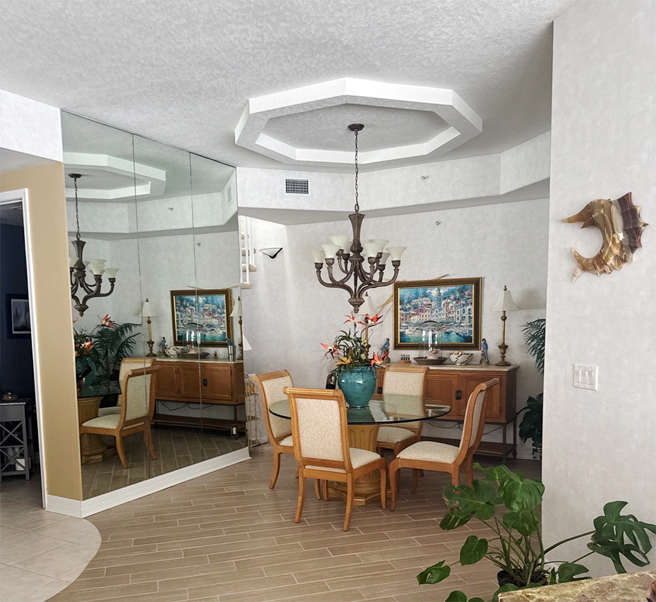 The All In One Cleaning & Restoration team standing in front of branded service vehicles in Port St. Lucie, Florida